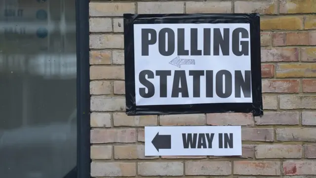 A sign marking the entrance to the polling station