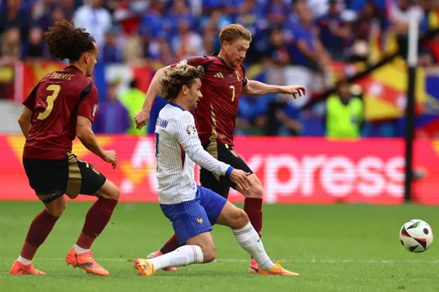 Kevin de Bruyne and Antoine Griezmann