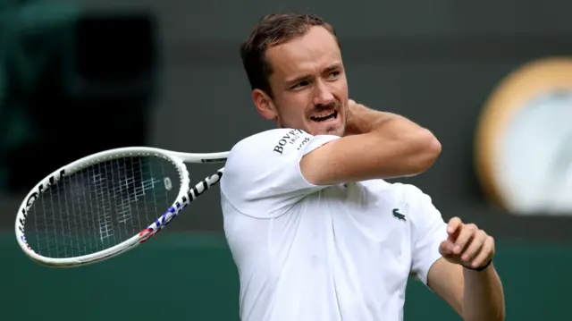 Daniil Medvedev in action at Wimbledon