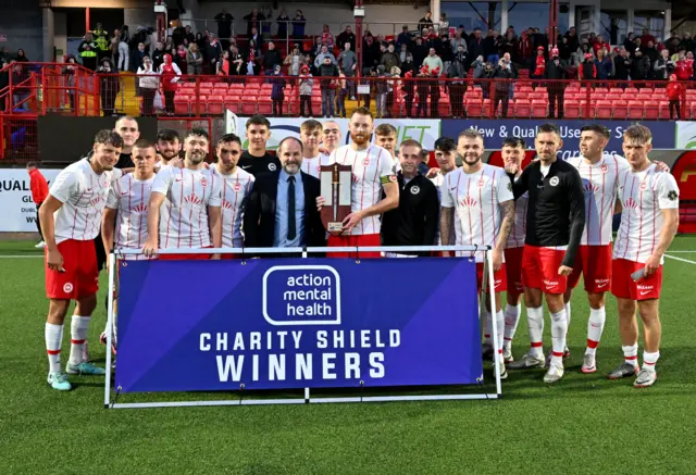 Larne with the Charity Shield