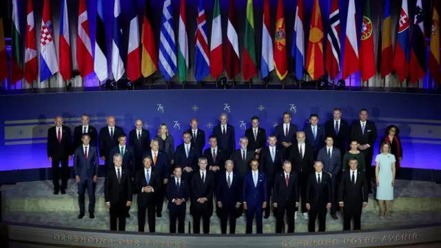 Nato leaders pose for a group photograph on 9 July