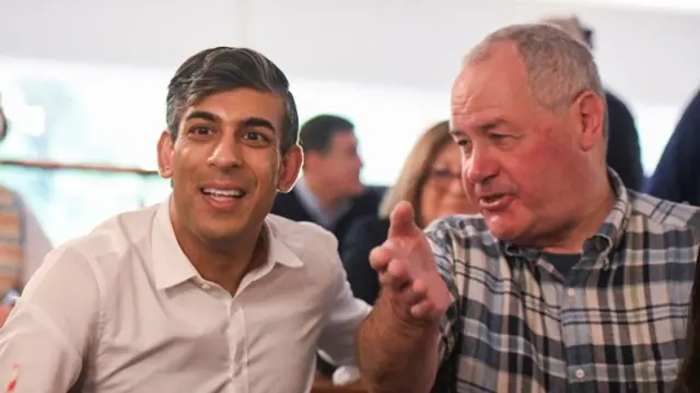 British Prime Minister Rishi Sunak and Bob Blackman, Conservative Member of Parliament, attend a Conservative general election campaign event in Stanmore, London, Britain May 26, 2024.