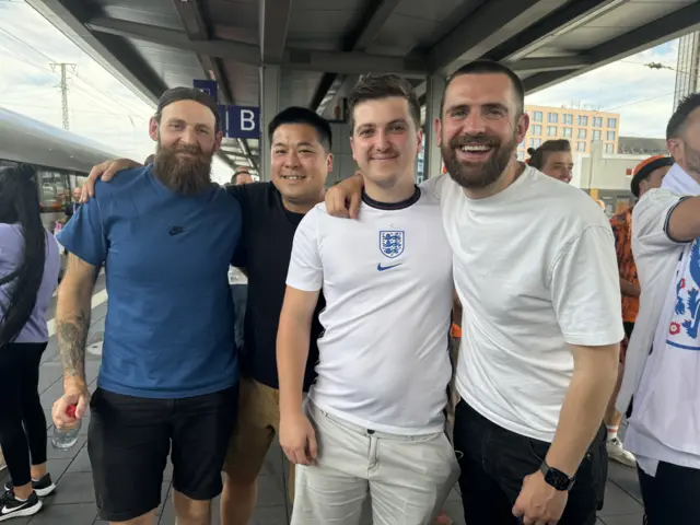 Four England fans at Dortmund station