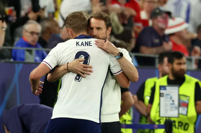 Harry Kane hugging Gareth Southgate