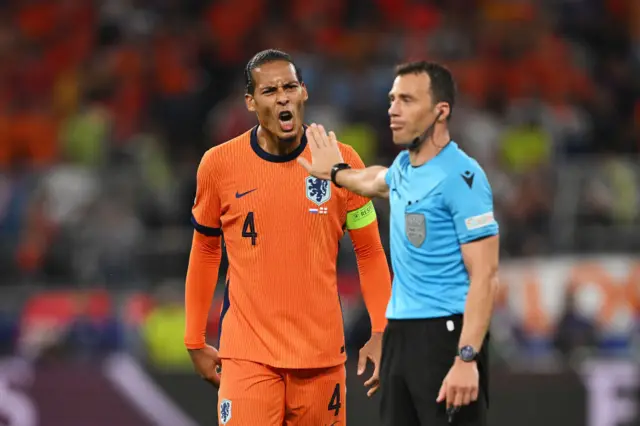 Virgil van Dijk shouting at the referee