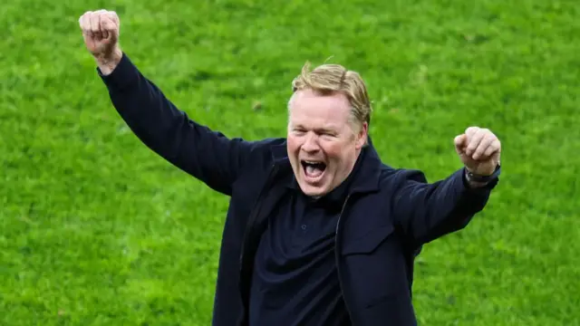 Netherlands' head coach Ronald Koeman celebrates after the UEFA Euro 2024 quarter-final football match between the Netherlands and Turkey at the Olympiastadion Berlin in Berlin