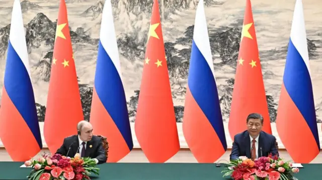 Russian President Vladimir Putin and Chinese President Xi Jinping attend a signing documents ceremony at the Great Hall of the People in Beijing, China May 16, 2024.