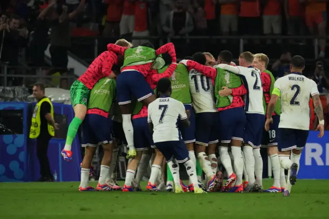 England celebrate after Ollie Watkins' goal