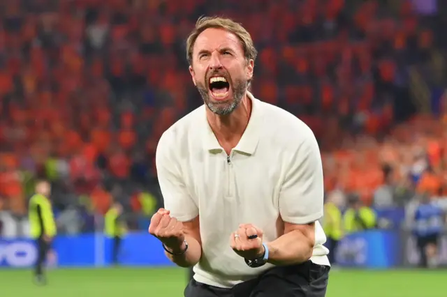 England coach Gareth Southgate celebrates after his team beat the Netherlands at Euro 2024