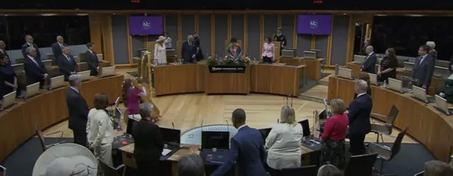 The King and Queen sit with MSs in the Senedd