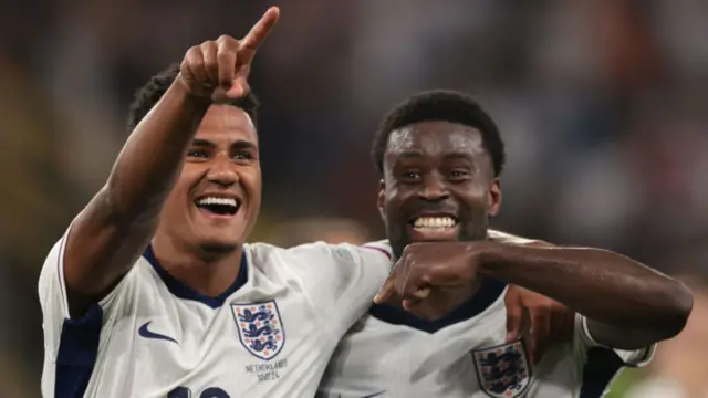 Ollie Watkins and Marc Guehi celebrate England's Euro 2024 win against the Netherlands