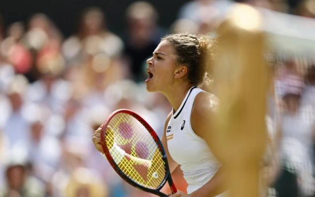 Jasmine Paolini of Italy celebrates winning the second set against Donna Vekic