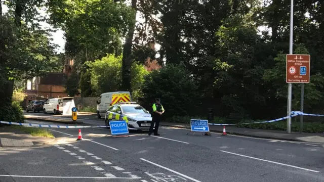 The road is closed on the approach to the bridge