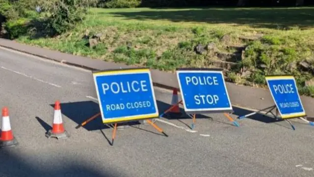 road closed signs near the bridge