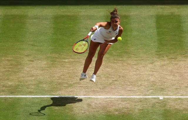 Jasmine Paolini of Italy serves to Donna Vekic