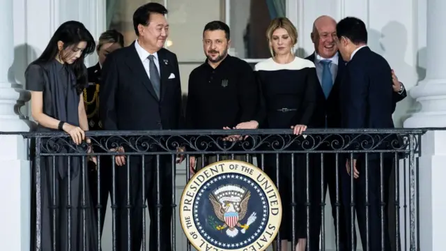 (L-R) Kim Kun-hee, first lady of South Korea; Yoon Suk Yeol, South Korea's president; Volodymyr Zelenskiy, Ukraine's president; Olena Zelenska, Ukraine's first lady and Christopher Luxon, New Zealand's prime minister, converse during an arrival ceremony prior to a dinner with NATO allies and partners in the East Room of the White House in Washington, DC, USA, 10 July 2024.