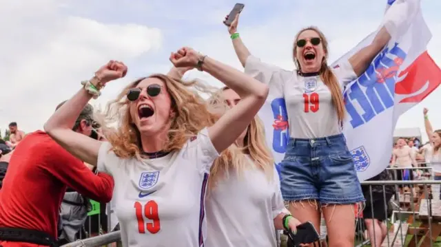 Two women celebrating at the Euros in 2021