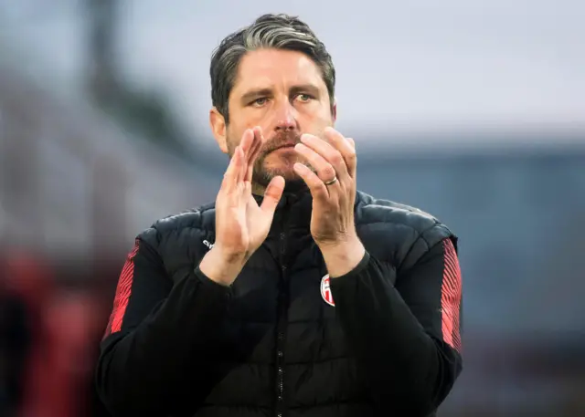 Ruaidhri Higgins applauds the fans after losing to Sligo