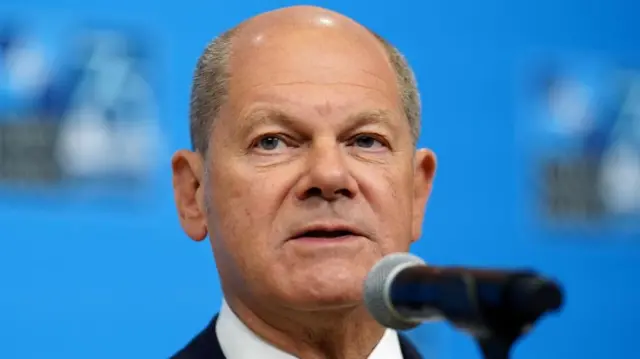 German Chancellor Olaf Scholz speaks to the media as he arrives at the NATO Summit in Washington, DC, USA, 11 July 2024