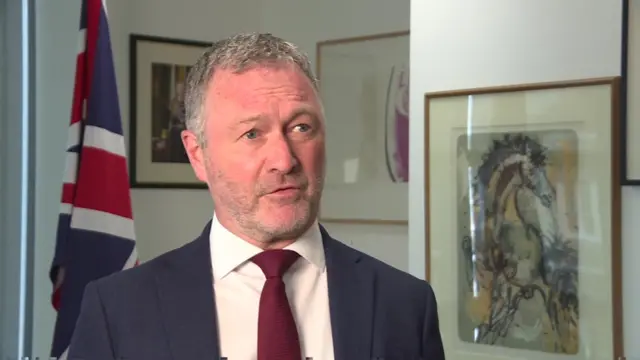 Headshot of Steve Reed while he speaks to media