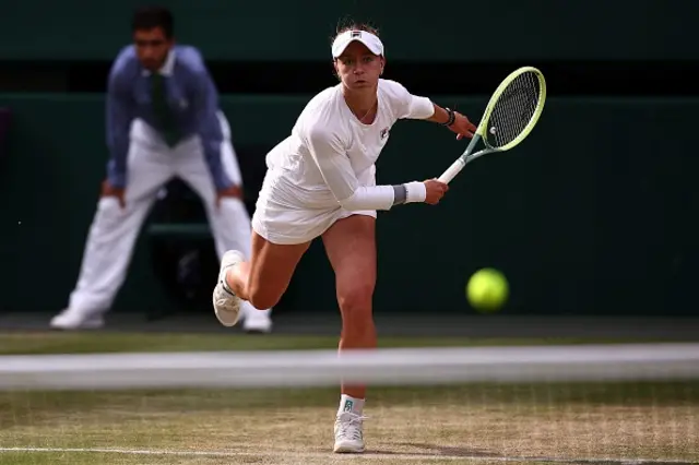 Barbora Krejcikova serves