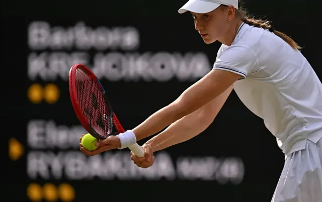 Rybakina prepares to serve