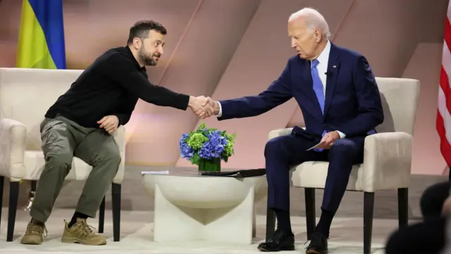 U.S. President Joe Biden and Ukraine's President Volodymyr Zelenskiy shake hands during a bilateral meeting, during NATO's 75th anniversary summit, in Washington, U.S., July 11, 2024.