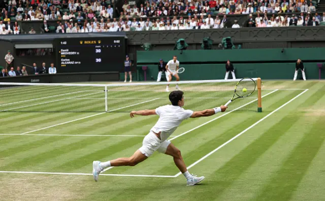 Carlos Alcaraz of Spain plays a forehand