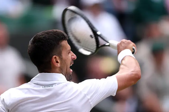 Novak Djokovic of Serbia plays a backhand