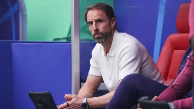 England manager Gareth Southgate sat in the dugout during a Euro 2024 game