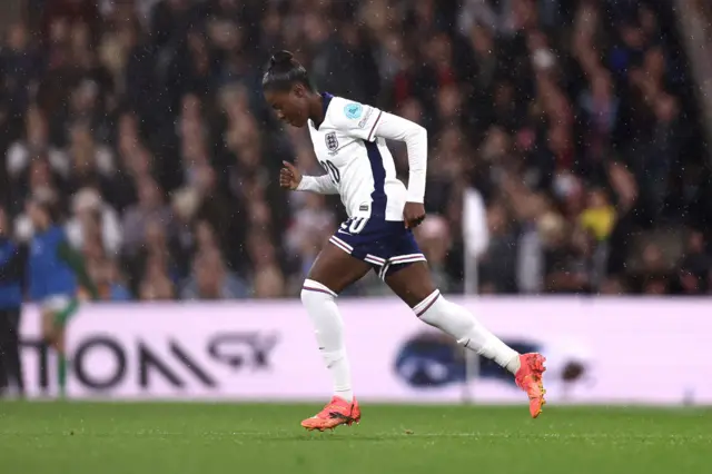 Naz runs on to the field to make her debut