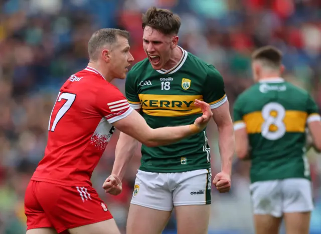 Kerry’s Cillian Burke celebrates scoring a point against Derry