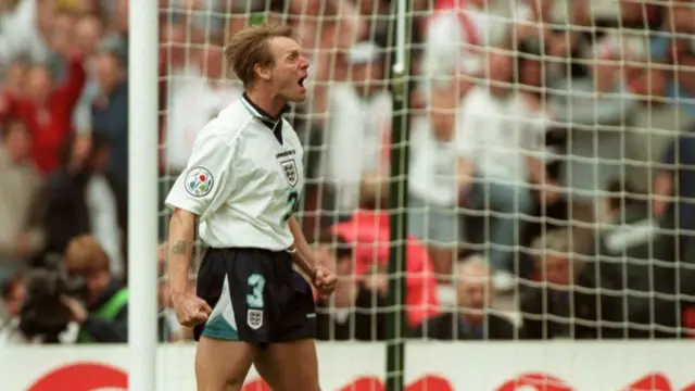 England's Stuart Pearce celebrates scoring in a penalty shootout against Spain at Euro 1996