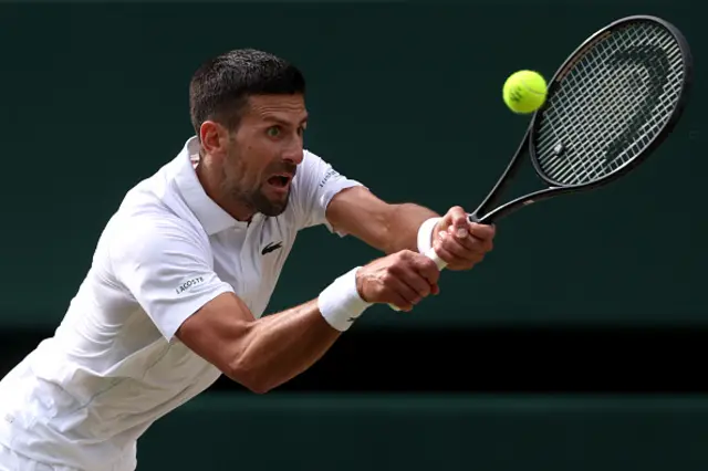 Novak Djokovic of Serbia plays a backhand