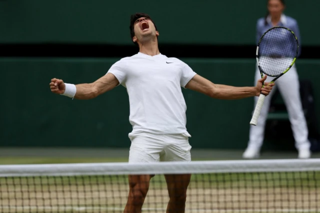 Carlos Alcaraz celebrates