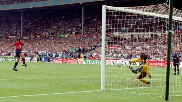 David Seaman saves Miguel Angel Nadal's decisive kick in England's 4-2 penalty shootout win against Spain in the Euro 96 quarter-final