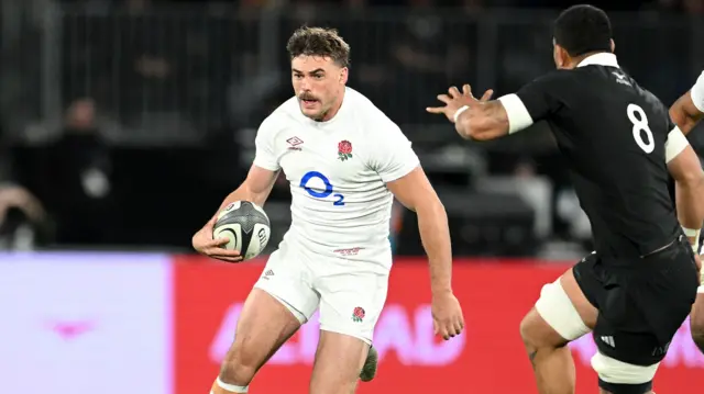 George Furbank carries the ball for England against New Zealand