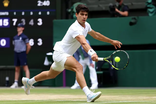 Carlos Alcaraz of Spain plays a backhand