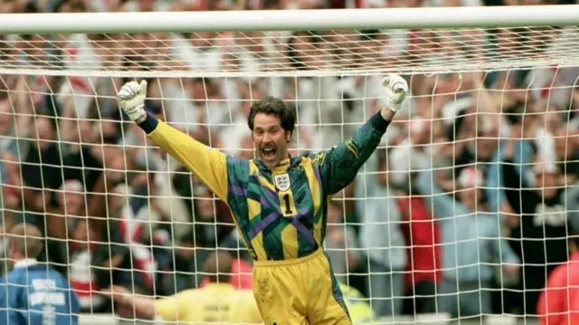 David Seaman celebrates saving Miguel Angel Nadal's decisive kick in England's 4-2 penalty shootout win against Spain in the Euro 96 quarter-final