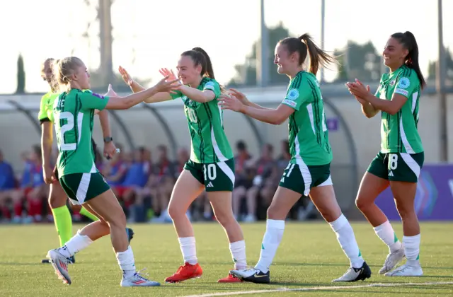 Northern Ireland celebrate the own goal