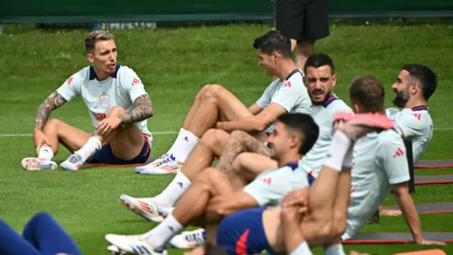 Spain players stretch before training at Euro 2024