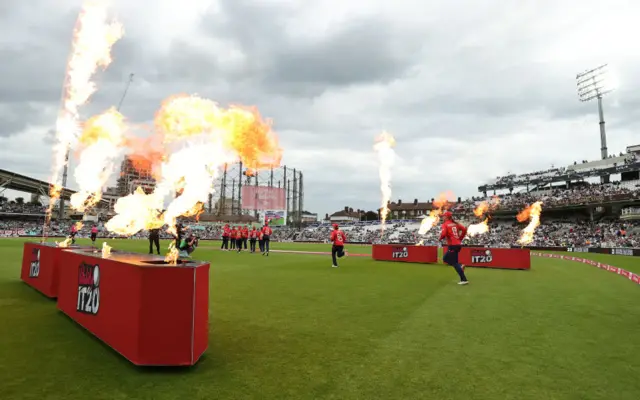 Players walk out at The Oval