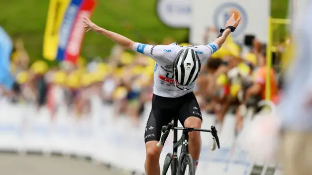 Tadej Pogacar bows as he wins stage six of the 2023 Tour de France