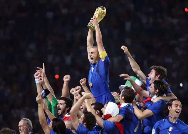 Fabio Cannavaro celebrates with the trophy after the World Cup 2006 final