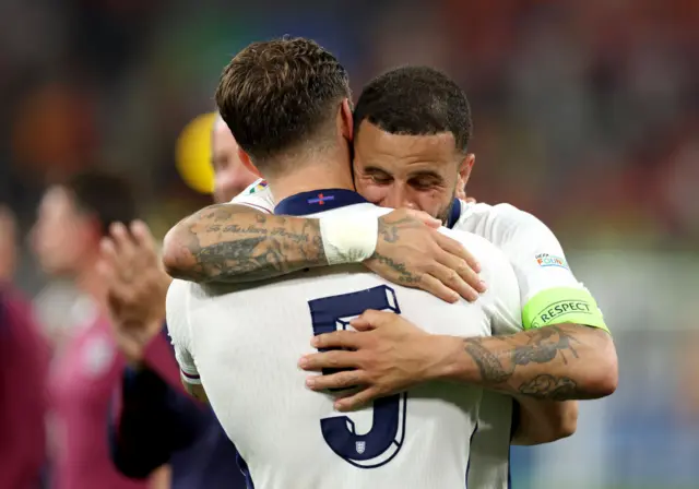 Kyle Walker and John Stones hug