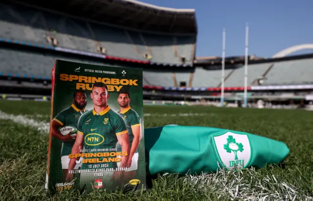 A programme and Ireland shirt on the pitch in Durban