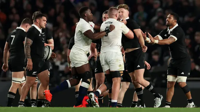 England and New Zealand players in a confrontation