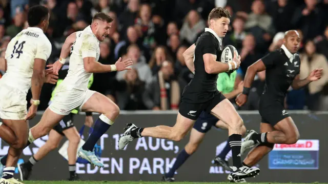 Beauden Barrett carries the ball for New Zealand