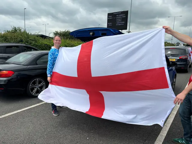 A fan at Folkestone with an England flag