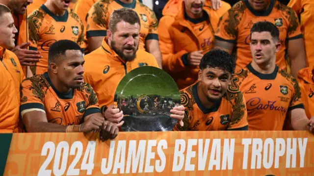 Australia celebrate with the James Bevan Trophy